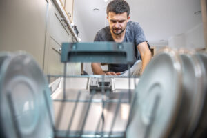 man has a problem with washing machine not filling with water