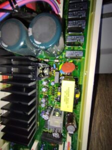 Close-up of Samsung computer components encased in thick, jelly-like silicone gel for moisture protection. 